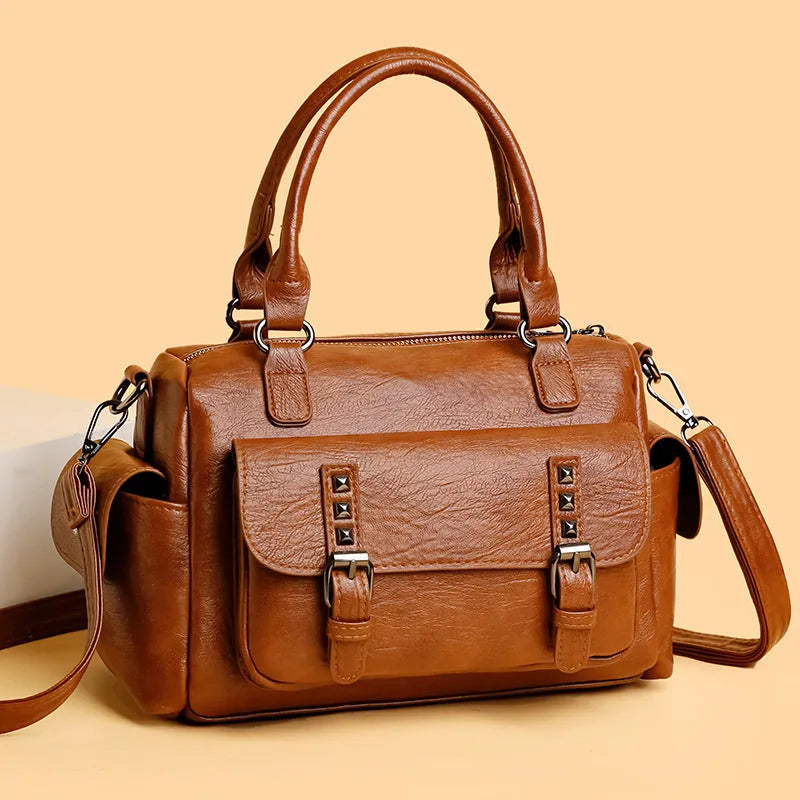 Vintage-style large capacity messenger bag in PU leather, showing contrast stitching and a horizontal square shape.