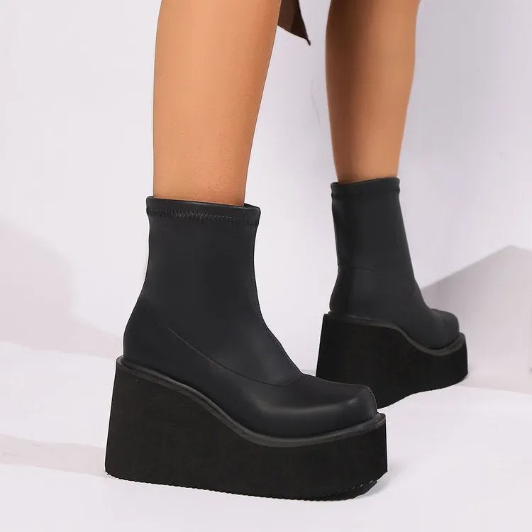 Plus size women's black wedge heel platform boots with round toe and waterproof PU upper
