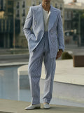 Blue and white striped polyester suit set with blazer and matching trousers