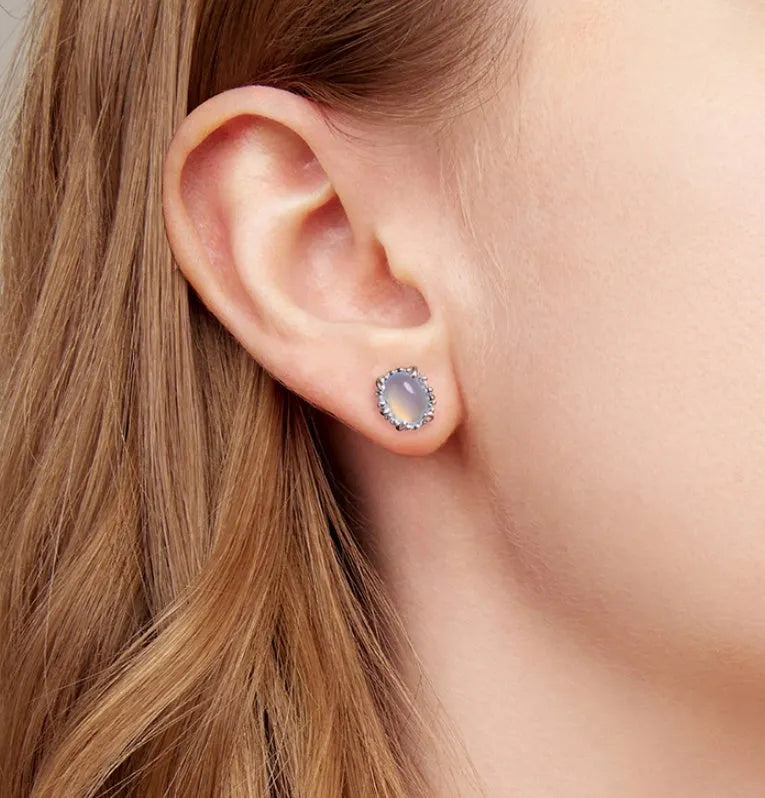 Sterling silver 925 magic stone ellipse stud earrings with French romantic style and electroplated finish
