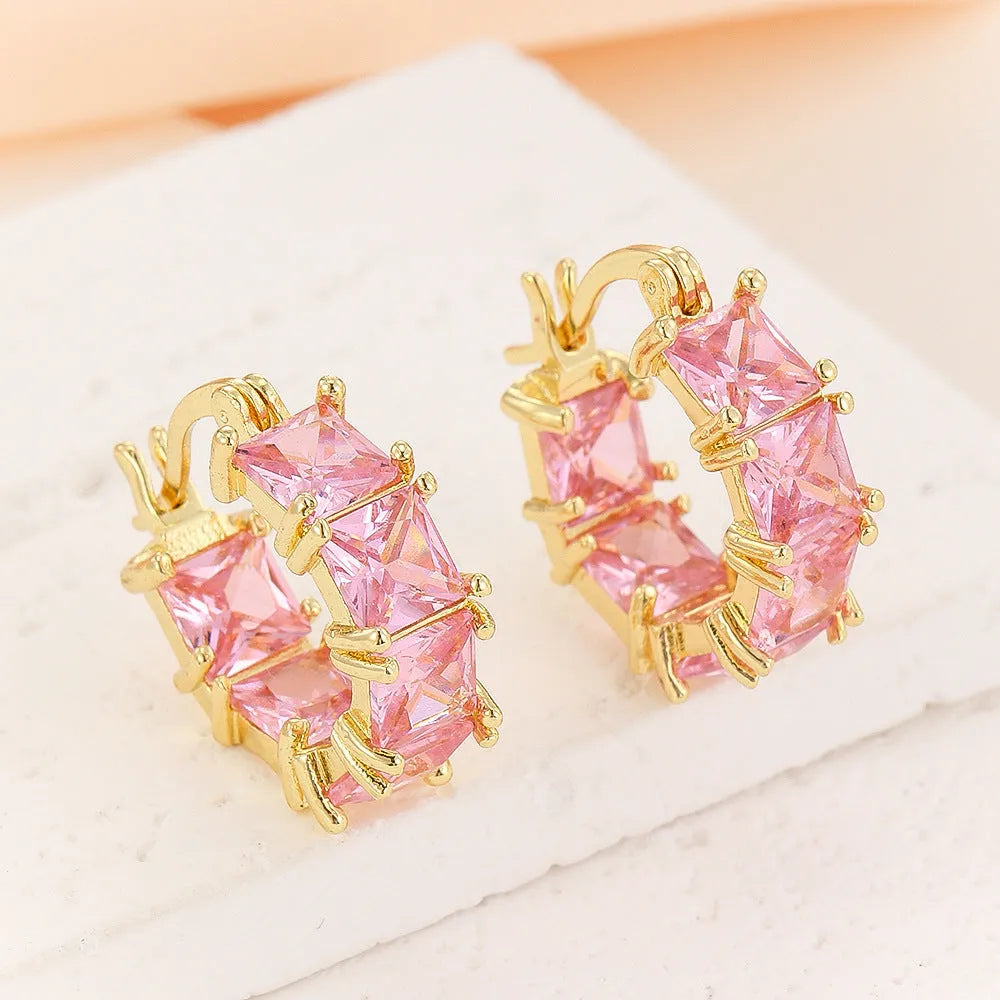 Geometric U-shaped zircon ear rings in gold setting with black, pink or white stone options
