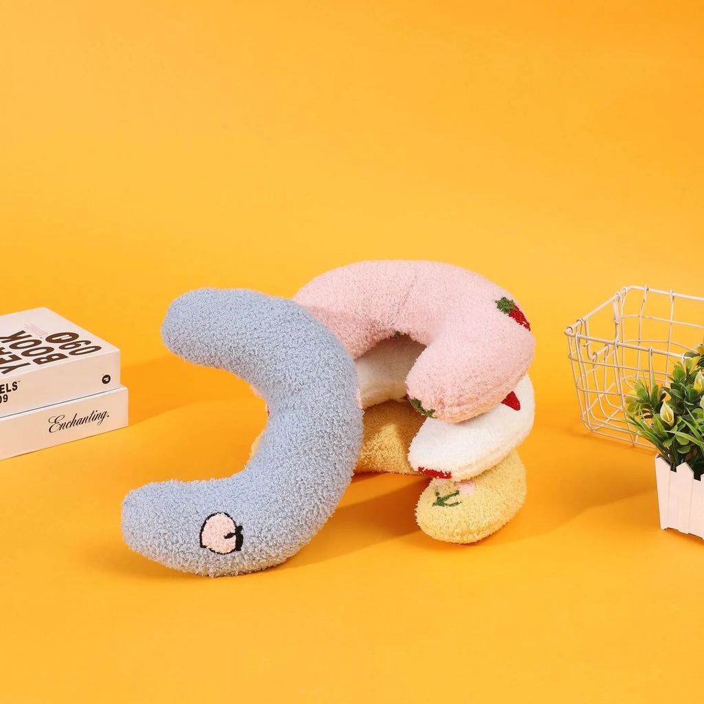 Half moon U-shaped cat pillow with cartoon designs in blue colour option