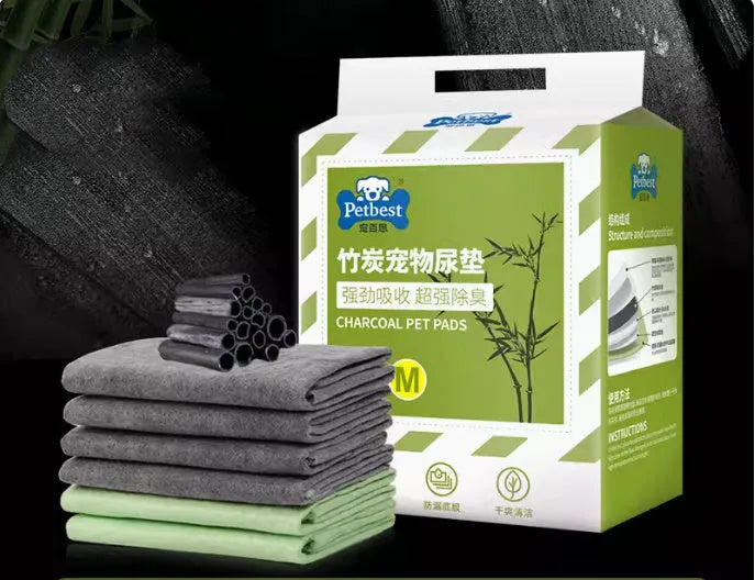 Pack of adhesive-backed dog urine pads showing size comparison between S, M, L and XL options