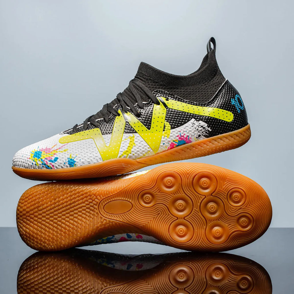 Low-top adult football boots with replaceable studs in Black & Yellow, White Black, and White Powder colour options.