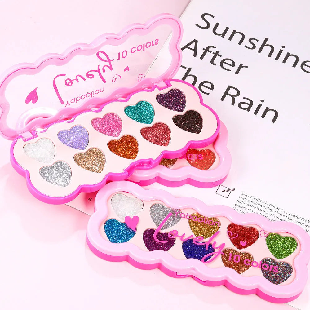 Pearlescent Heart ten-color sequins eye shadow palette showing shades of white, beige, pink, purple, brown, blue, black, royal blue, maroon, and coral.