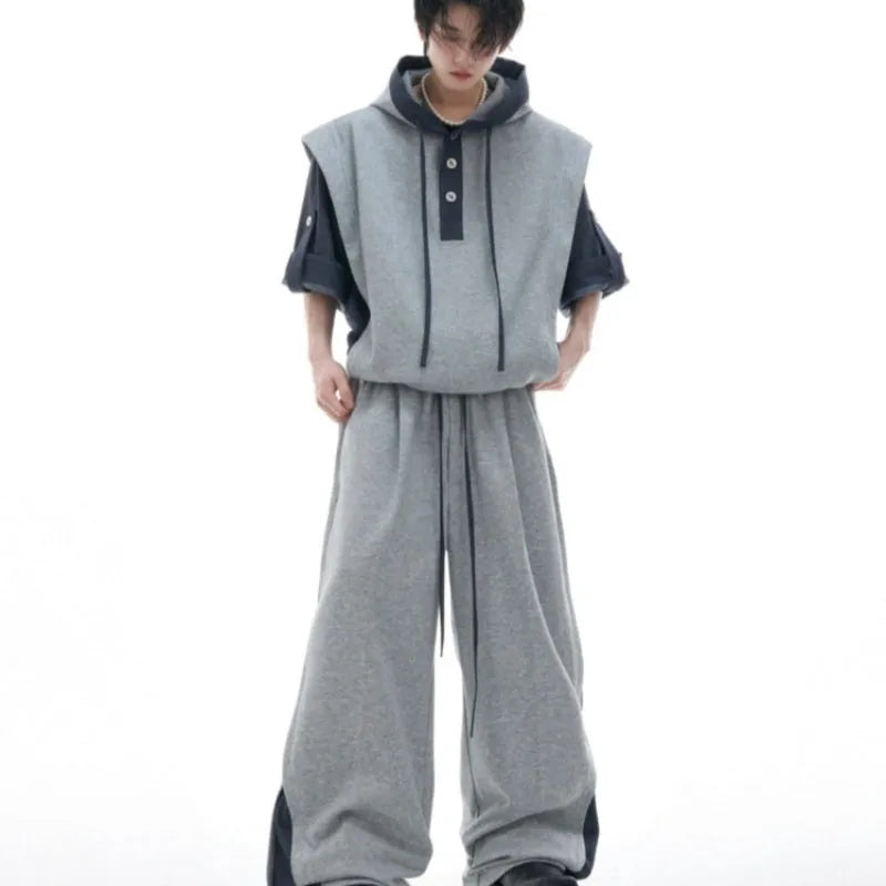 Men's black hooded polyester tracksuit with three-dimensional stitching on jacket and trousers