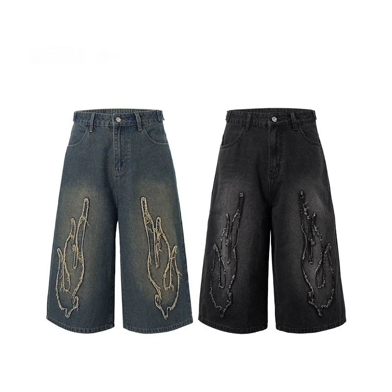 Men's cropped denim shorts with flame embroidery patch in straight leg cut