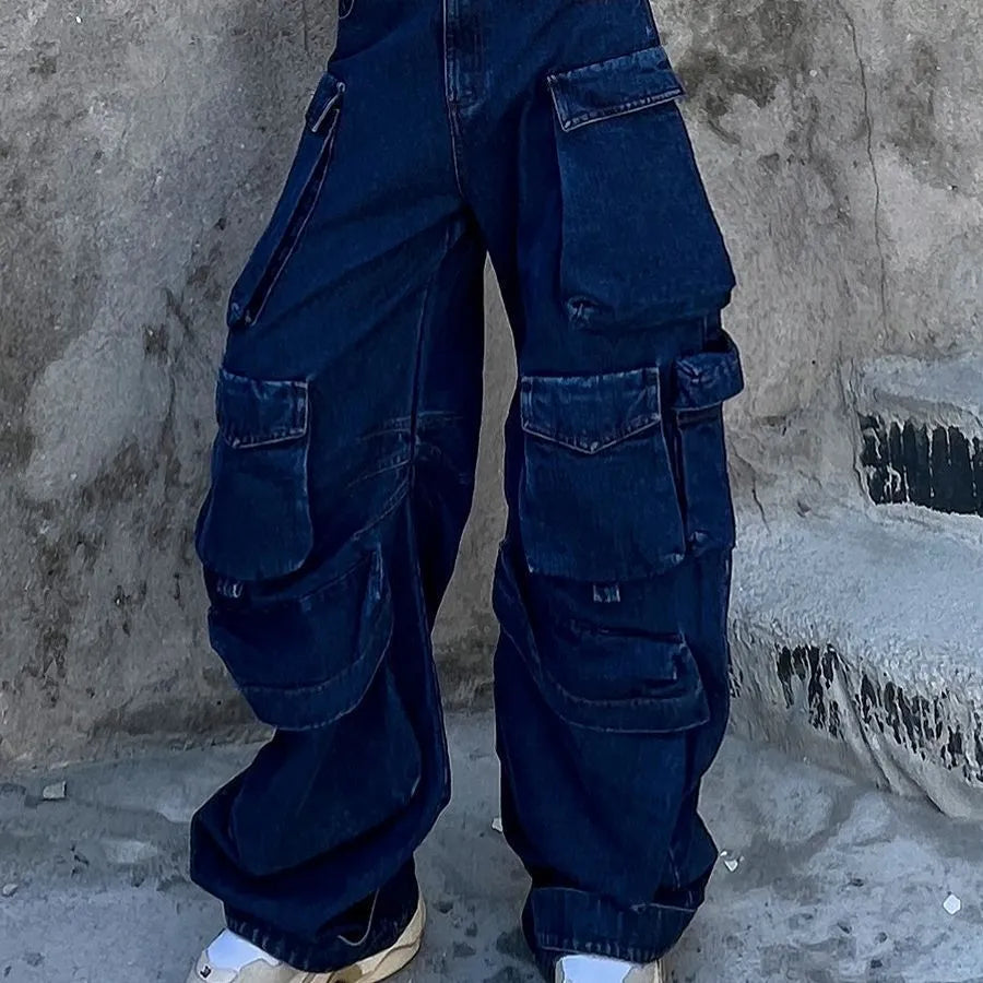 Dark blue wide-leg distressed jeans with high waist and multiple pockets on a mannequin