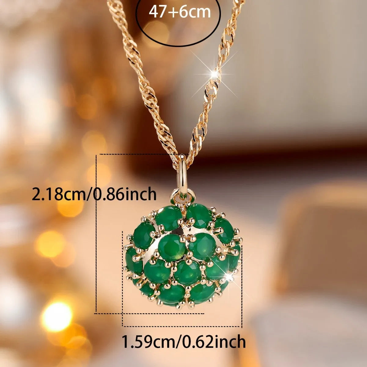 Champagne gold round emerald and diamond pendant necklace on a copper chain