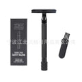 Traditional manual shaving razor and brush combination kit in black and silver metal finishes.