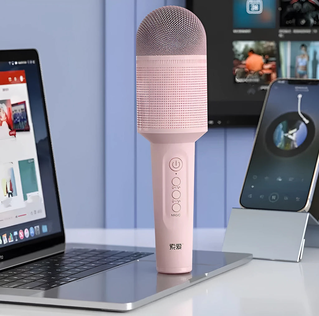 Wireless Bluetooth karaoke microphone in pink, blue, or green with integrated audio system