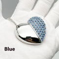 Colourful heart-shaped USB flash drive with brick pattern design on a metal body.