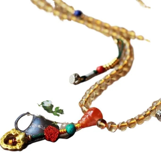 Natural citrine bracelet with 1mm yellow beads on filament string, light luxury style