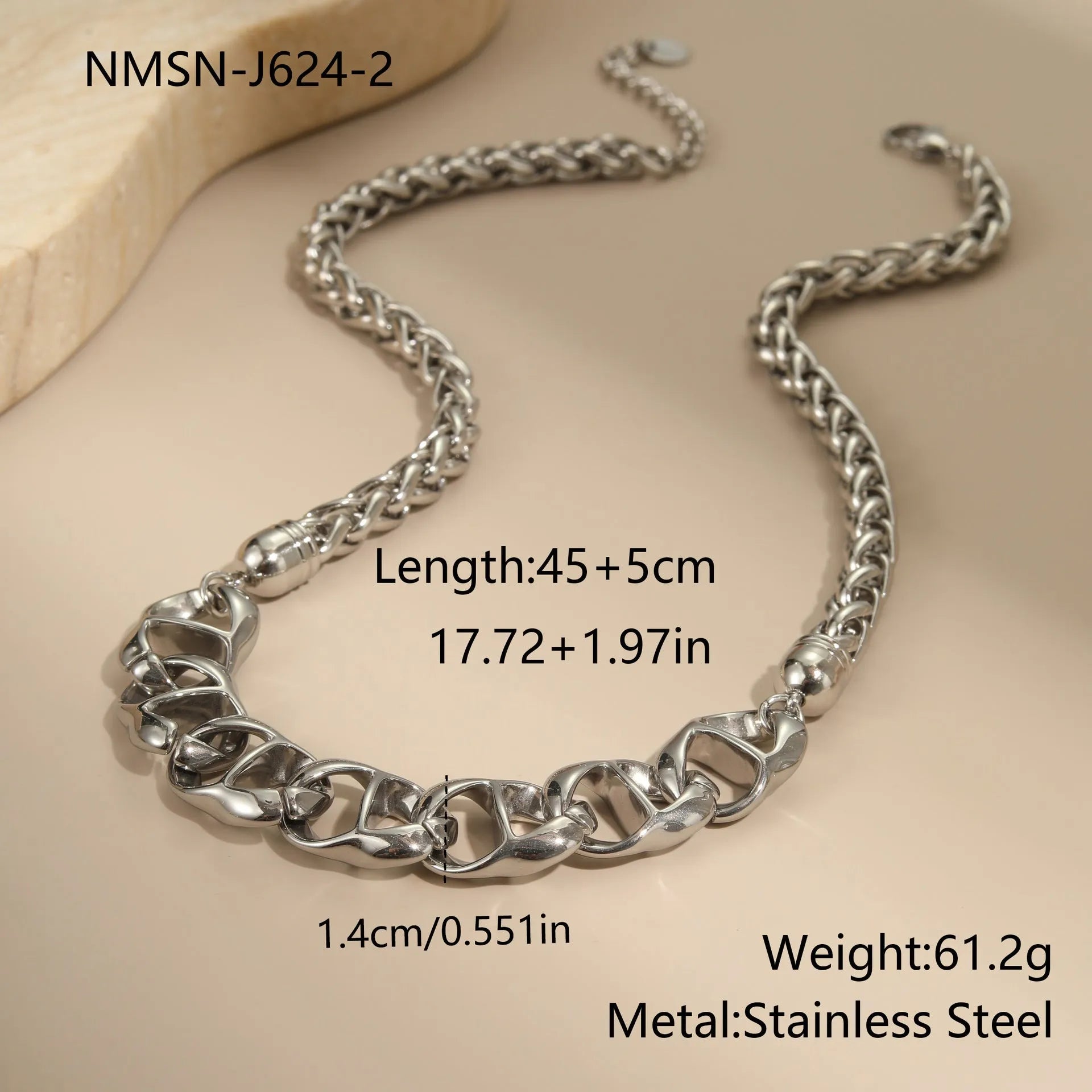 Stainless steel geometric pendant necklace with gold plating on a regular chain.