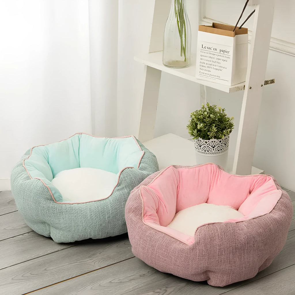 Blue octagonal pet bed with raised sides and a removable mat, for a small dog or cat.