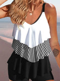 Women's sleeveless backless spaghetti-strap bikini with ruffle detail in various colours and patterns