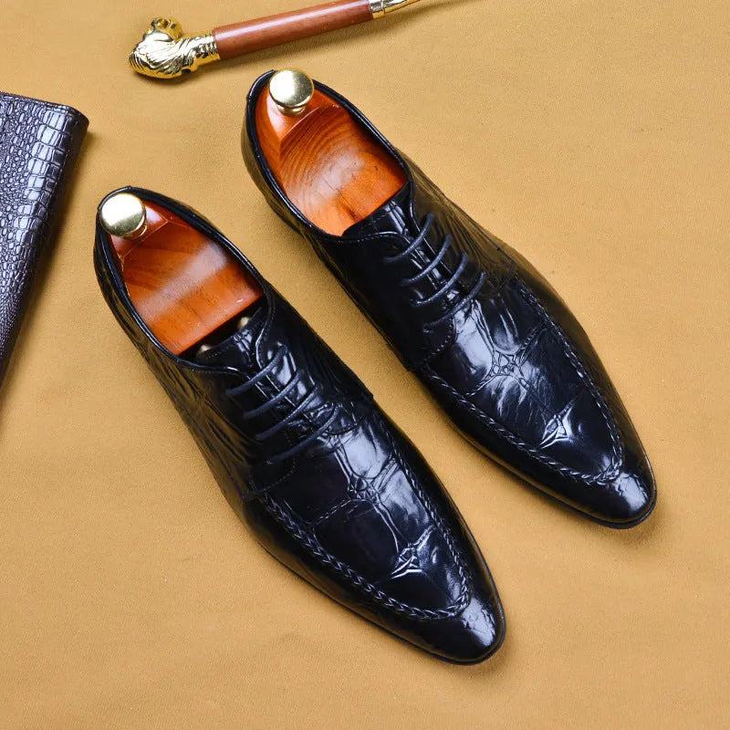 Men's black leather casual shoes with a silver horse bit buckle and a low rubber sole.