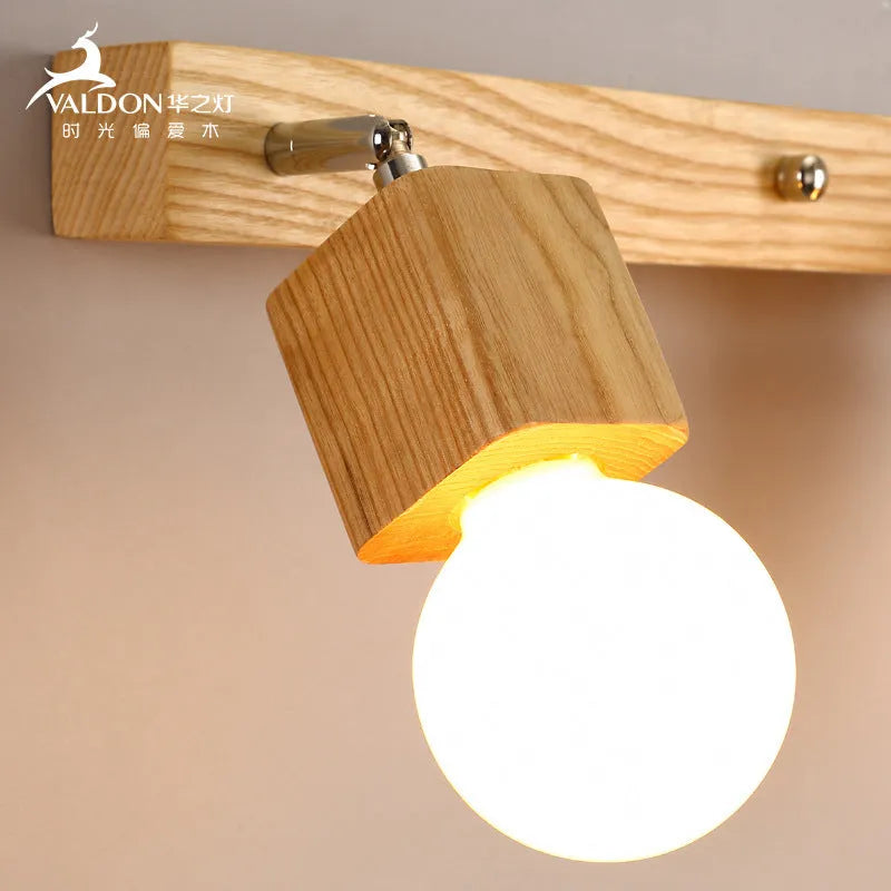Single-headed 24cm wide LED mirror cabinet wall lamp mounted on a wall