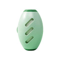 Green washable gel lint roller ball removing pet hair from blue fabric