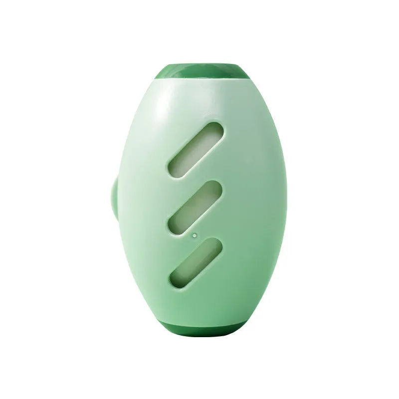 Green washable gel lint roller ball removing pet hair from blue fabric