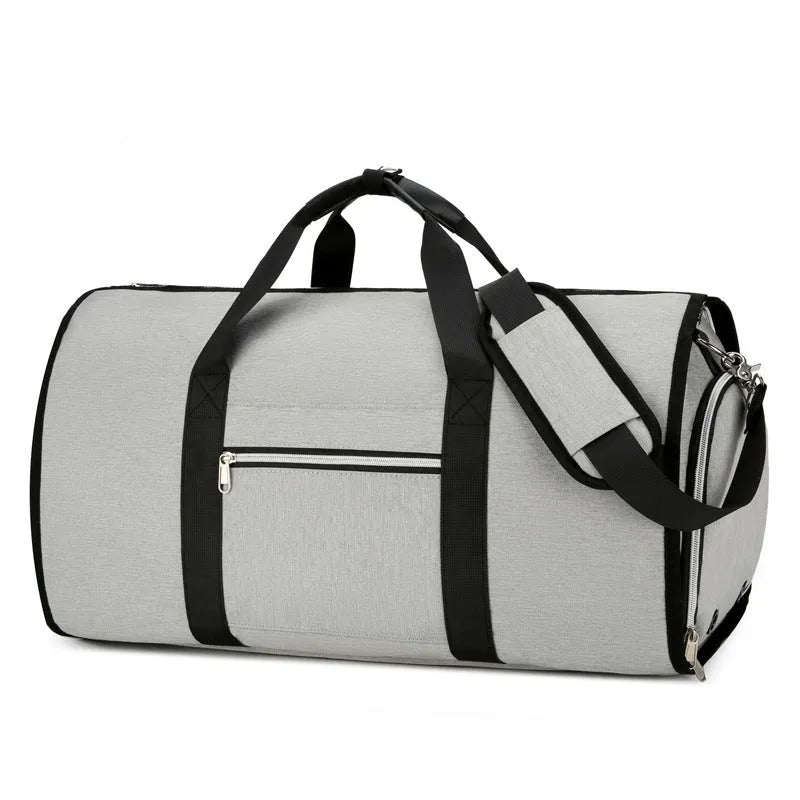 An Oxford cloth expandable sports storage bag in grey, showing compartments for dry wet separation.