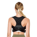 Black adjustable anti-humpback posture correction belt worn on torso