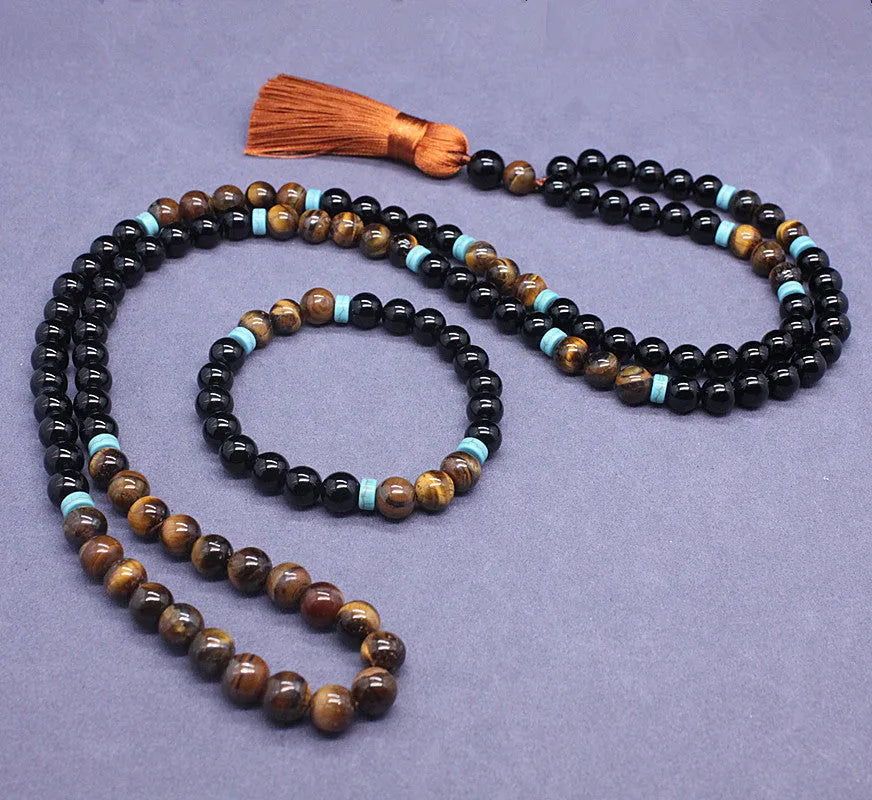Agate and tiger's eye stone jewellery set with black bracelet and tiger-shaped pendant necklace
