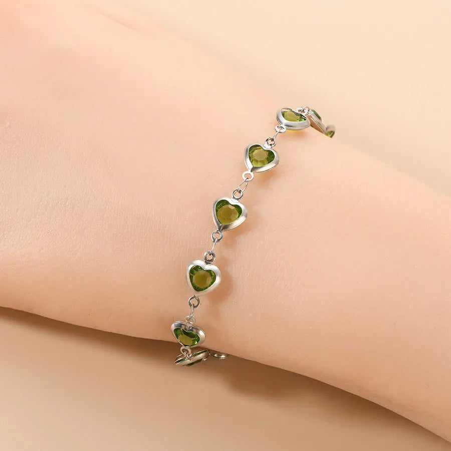 Geometric heart bracelet with colourful electroplated finish on stainless steel, unisex design