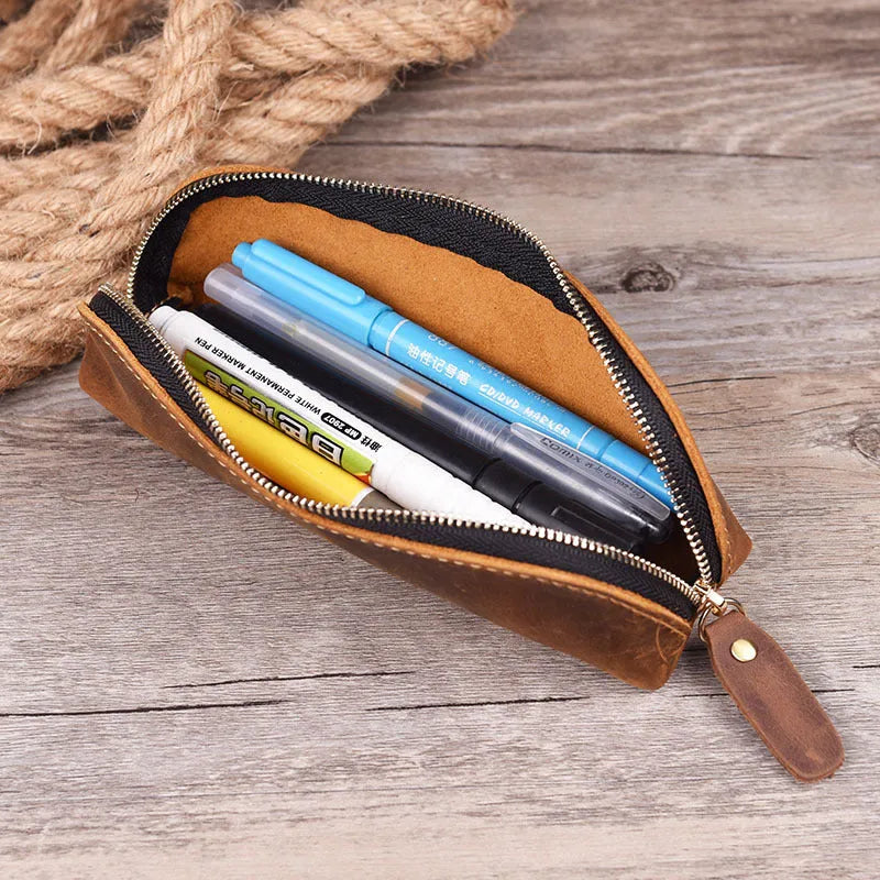 Square leather pencil case with zip closure in black colour showing 18cm dimensions