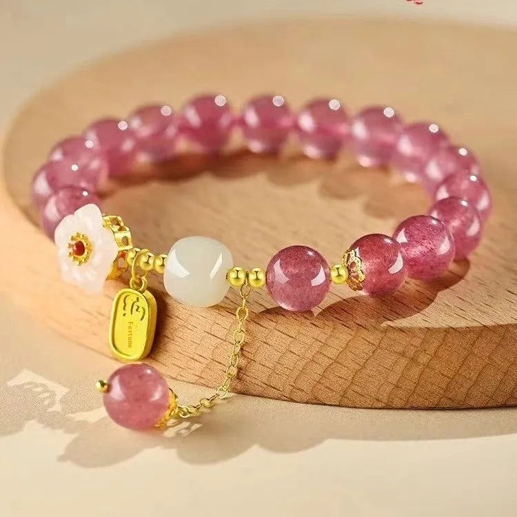 Handmade strawberry quartz crystal bracelet with green quartz moon charm for women