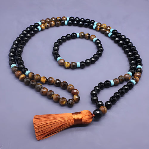 Agate and tiger's eye stone jewellery set with black bracelet and tiger-shaped pendant necklace