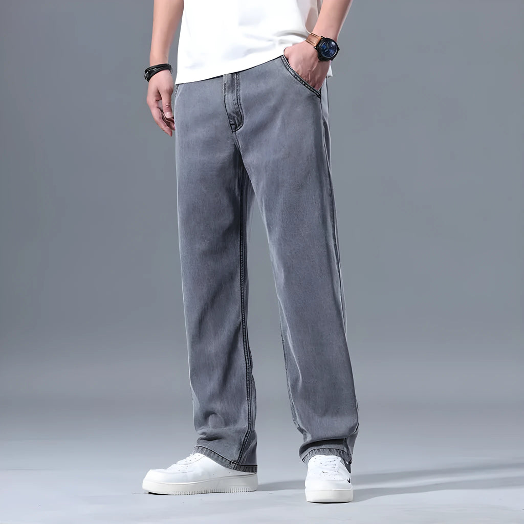 Men's loose straight leg jeans in lyocell blend fabric showing light blue colour option
