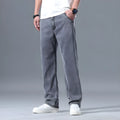 Men's loose straight leg jeans in lyocell blend fabric showing light blue colour option