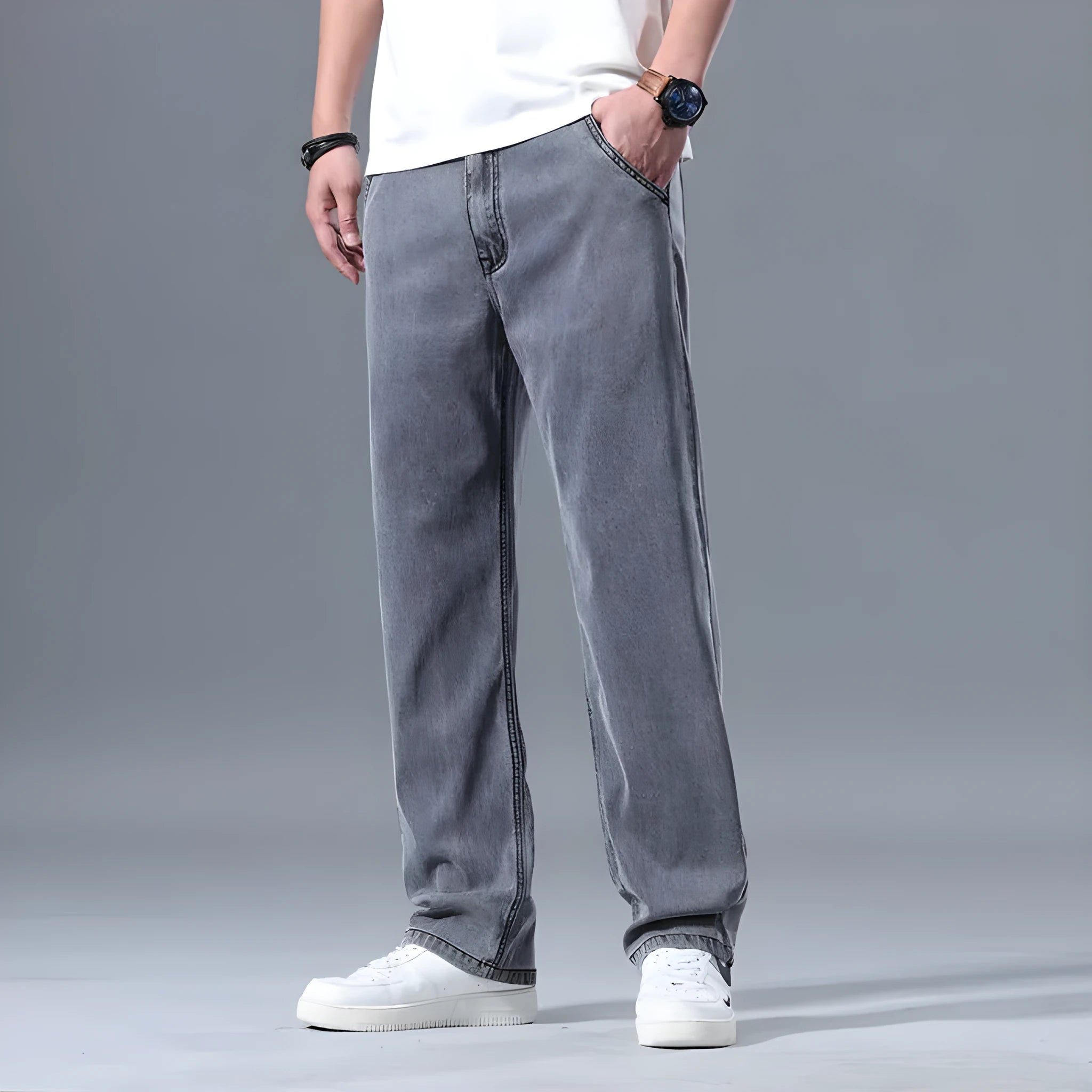 Men's loose straight leg jeans in lyocell blend fabric showing light blue colour option