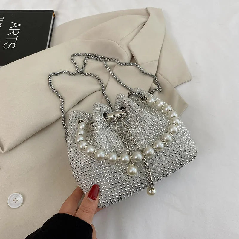 Diamond detailed PU leather crossbody bag with chain strap in bucket shape design