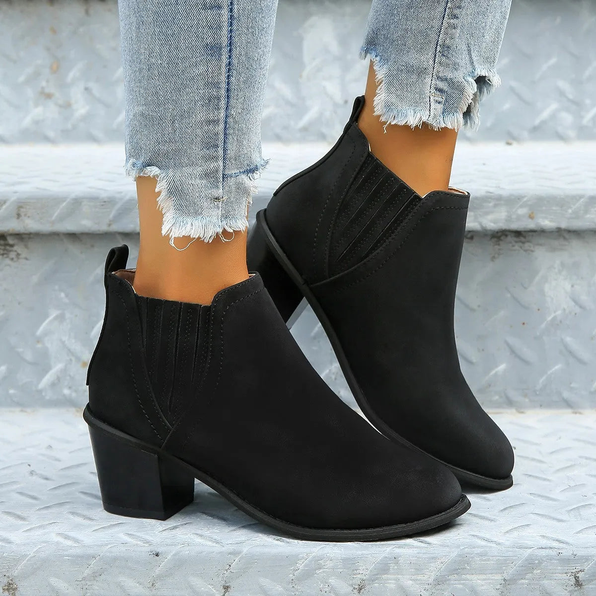 Women's black ankle boots with pointed toe and thick square heel design for autumn winter wear