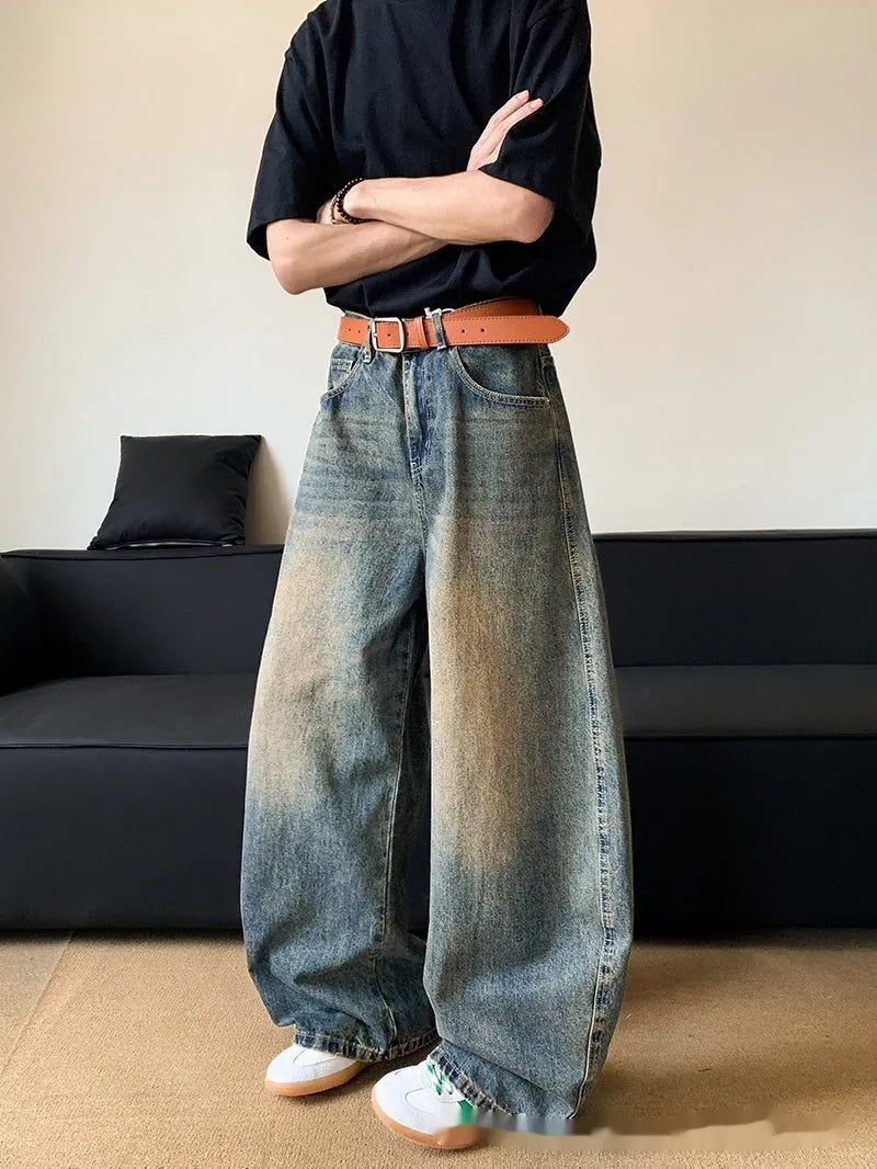Men's retro blue distressed jeans with wide-leg cut and micro-elastic cotton blend fabric
