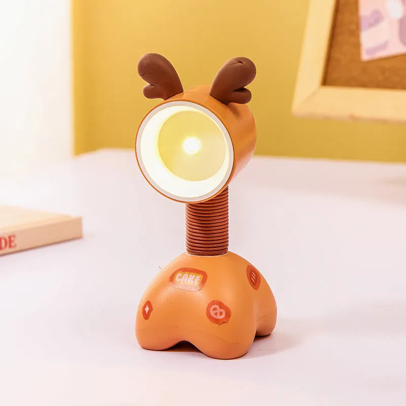 DIY magnetic cartoon small night lamp with multi-angle adjustable lighting on desktop