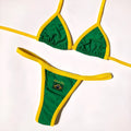 Women's blue bikini set showing sleeveless T-back bra and matching shorts-length briefs