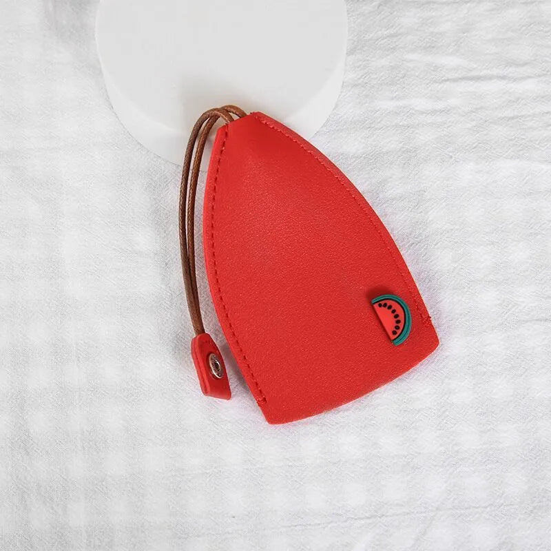 Cartoon pull-out key case in PU leather measuring 14 by 7.5 centimetres