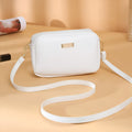 Solid colour minimalist ladies shoulder bag in PU leather with a three-dimensional pocket