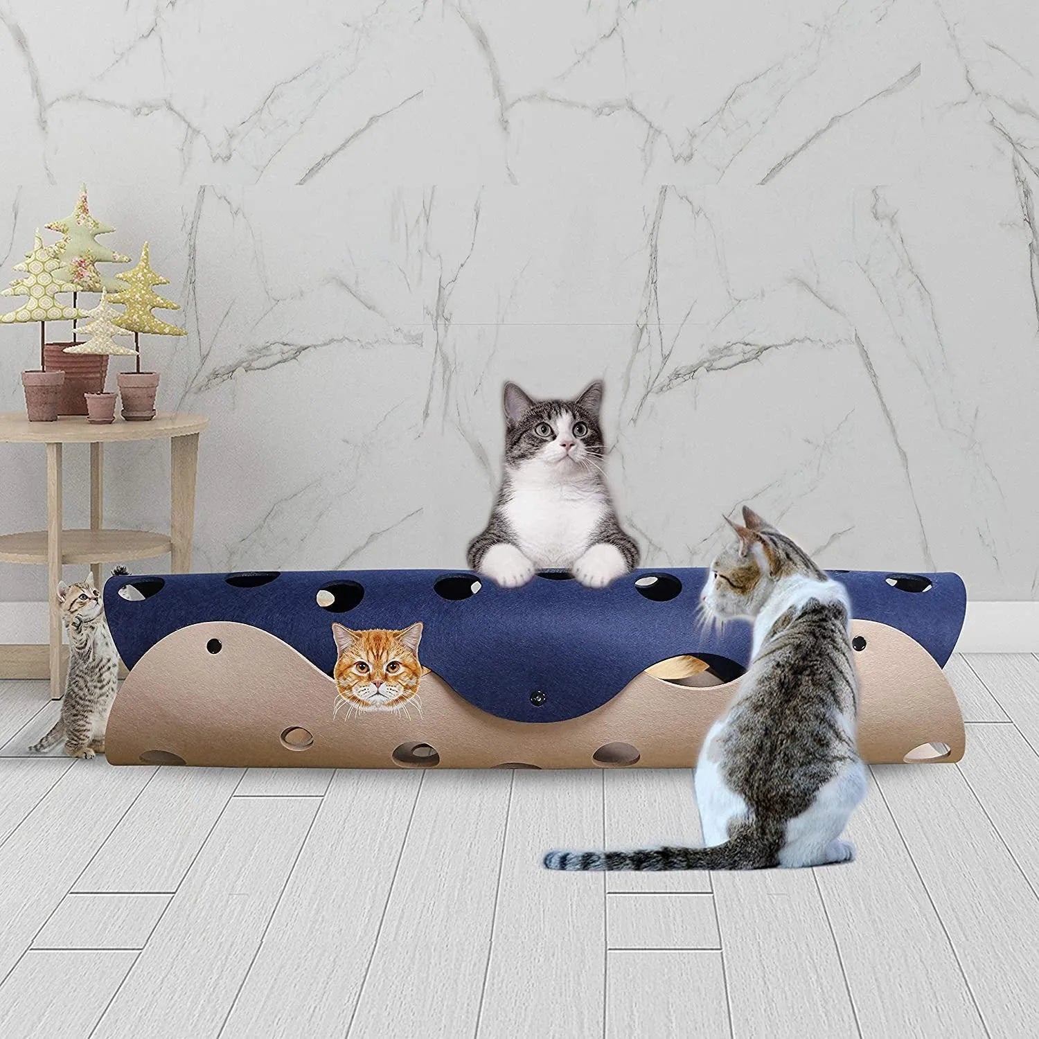 Deformable felt cat tunnel with peepholes in cement grey and orange, assembled on floor