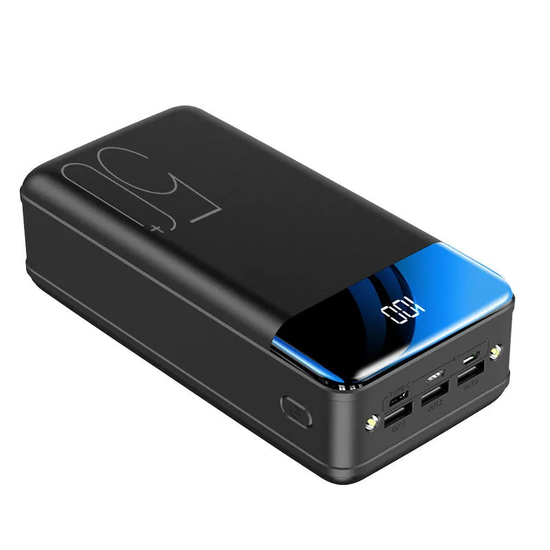 Large capacity 50000mAh power bank with three USB ports in black or white plastic casing