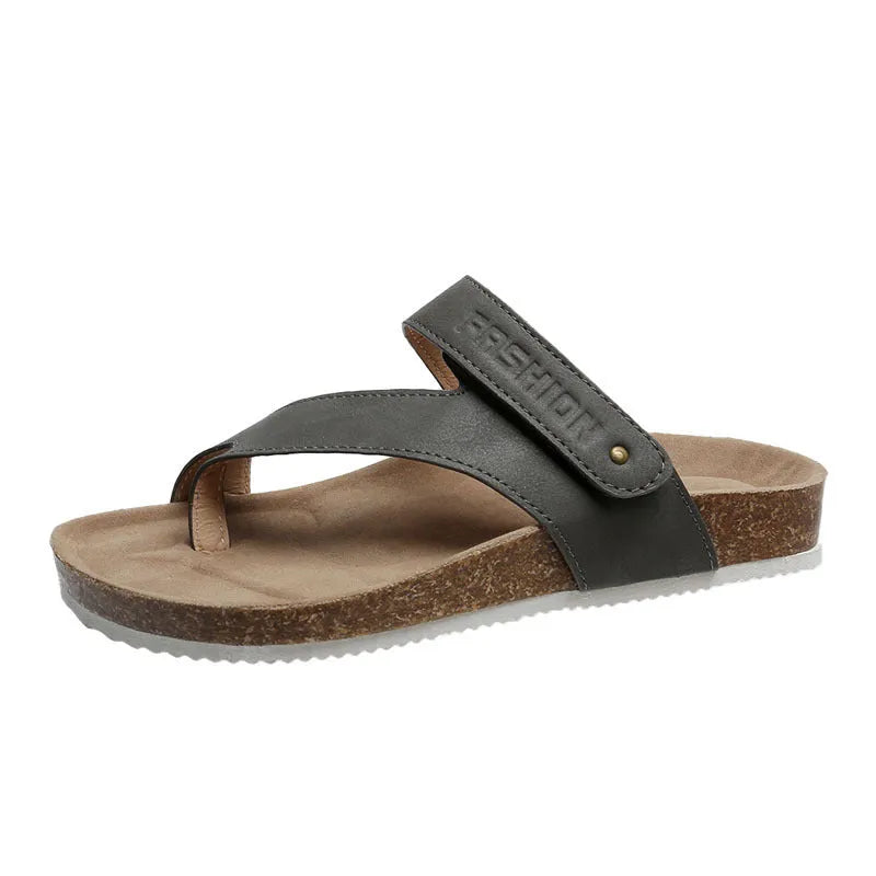 Blue flat toe ring flip-flops with a thick foam sole on a solid background.