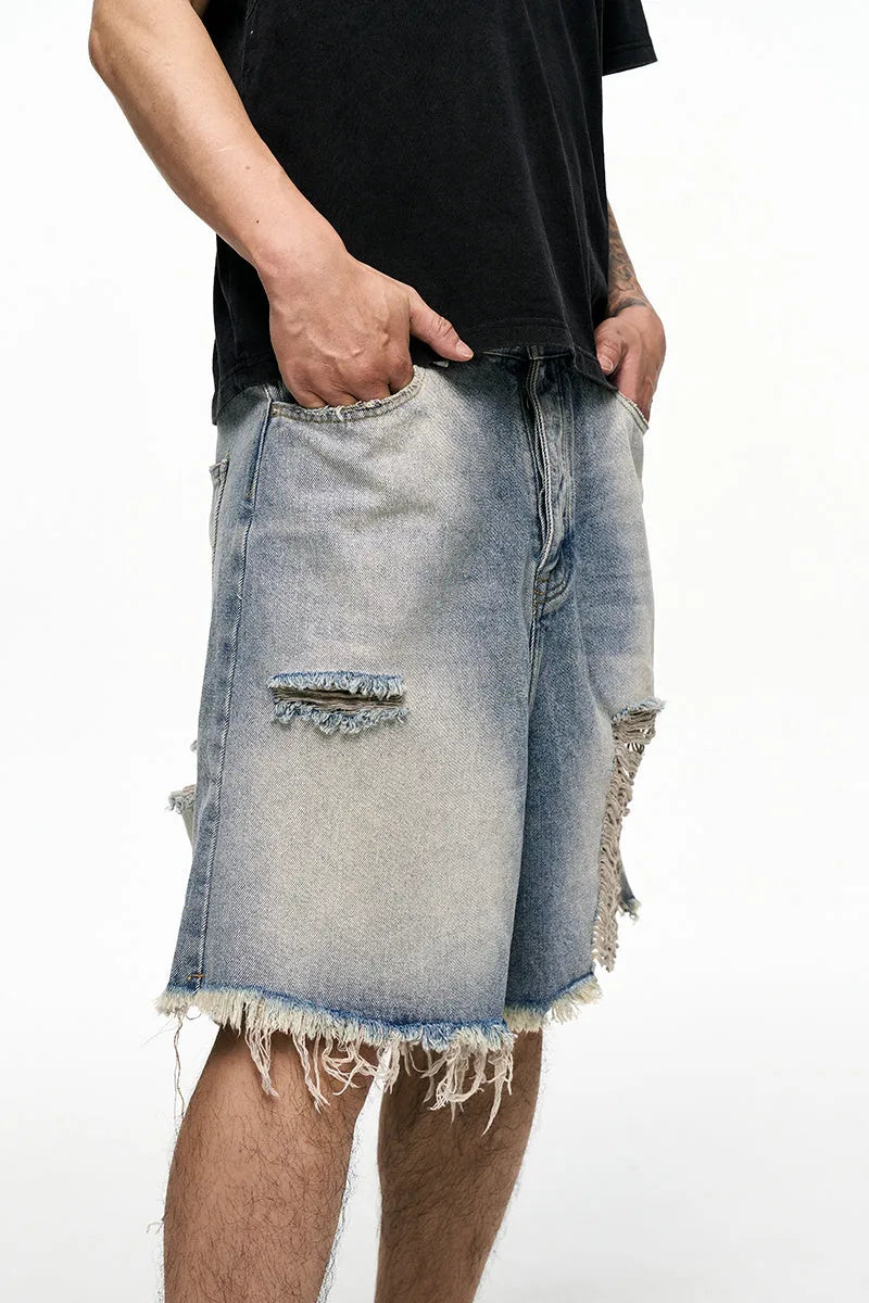Men's light blue retro washed denim shorts with baggy wide-leg design and fifth pants length