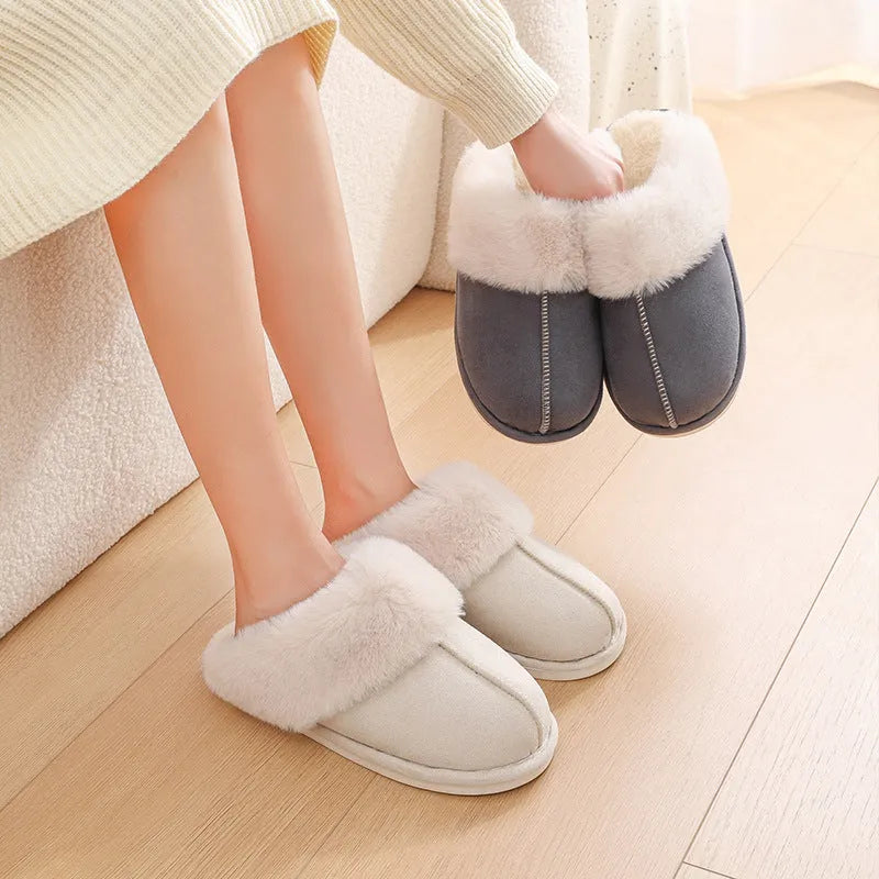 Women's brown plush indoor slippers with round toe, flat heel, and non-slip sole.