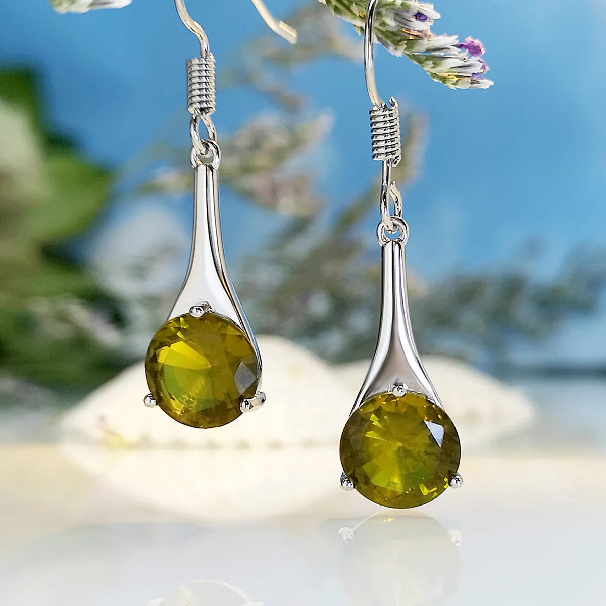 Olive green topaz drop shape earrings with minimalist water drop design