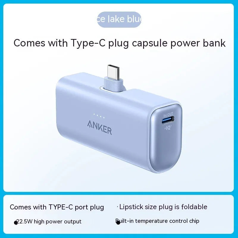 Small capsule-shaped power bank in five colours with a foldable USB-C cable attached