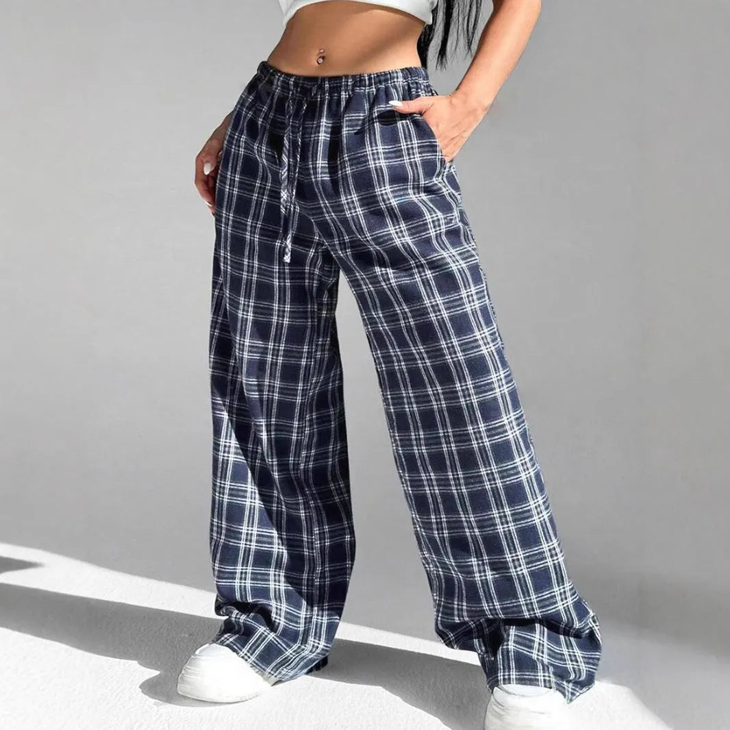 Women's blue and red plaid casual trousers with drawstring waist and side pockets.