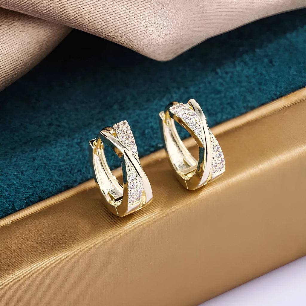 Geometric drop earrings with zircon detailing in 14K yellow gold-coloured copper